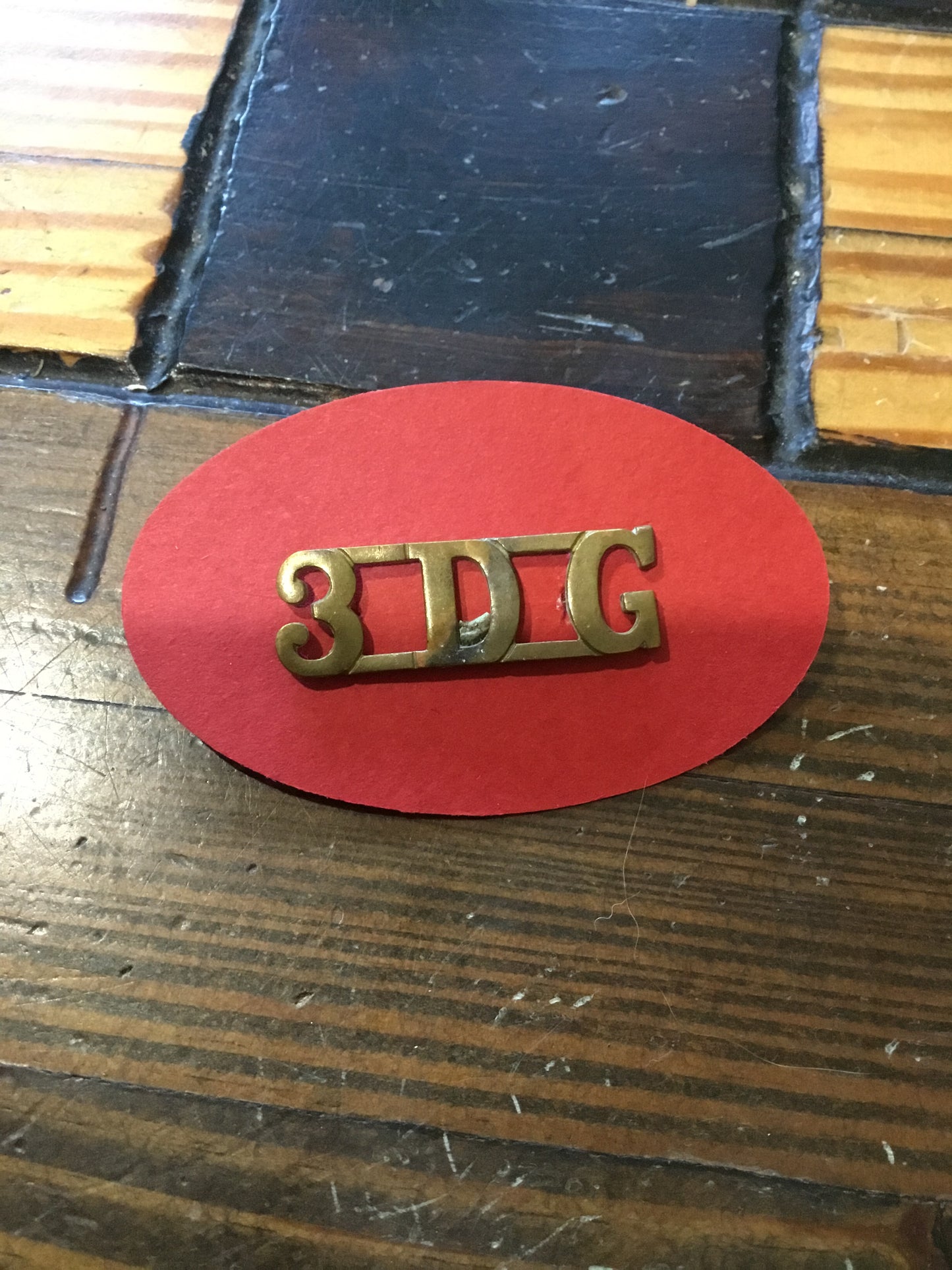 British: 3rd Dragoon Guards brass shoulder title. Circa.1914/1918