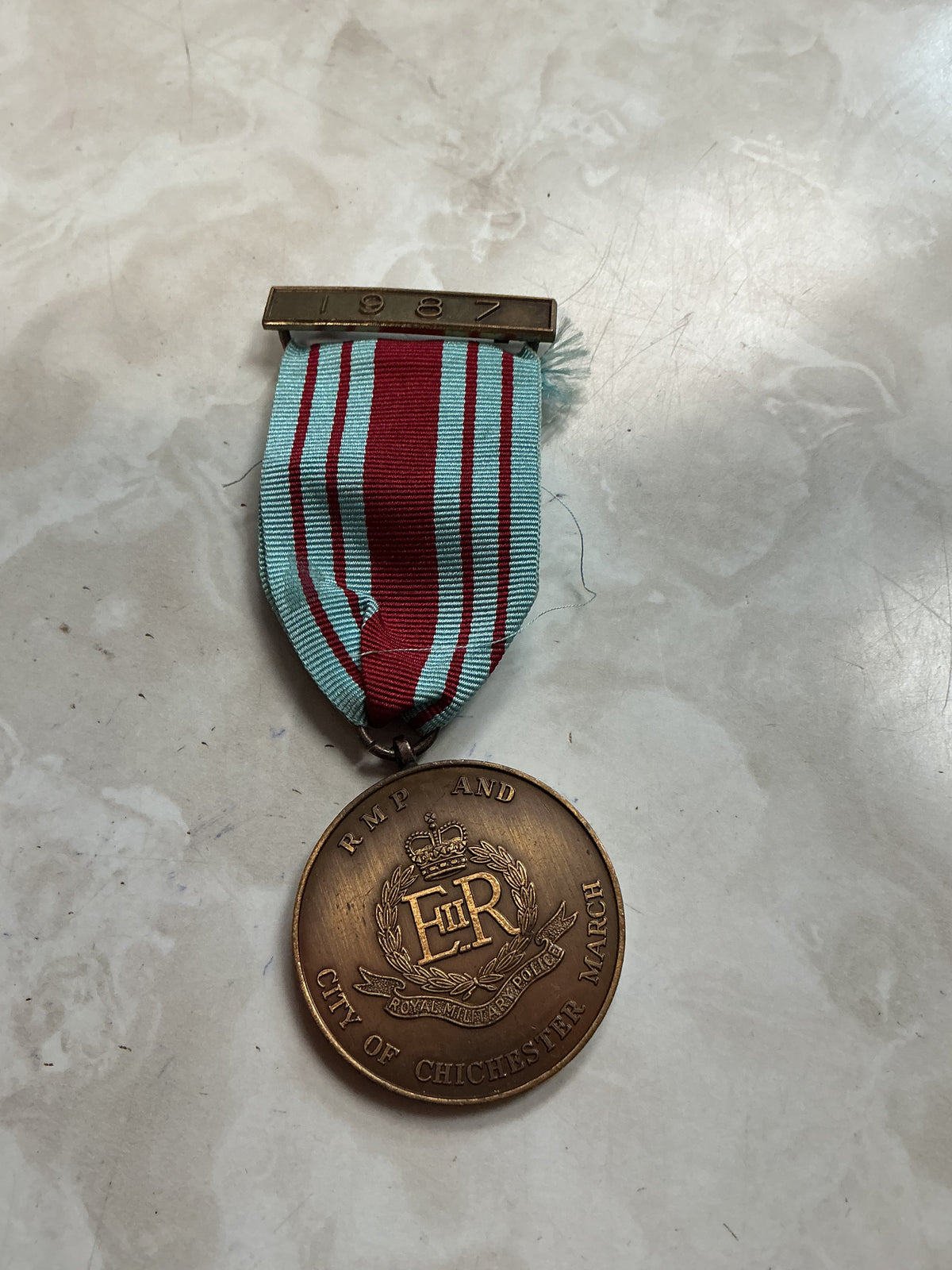 British Army 1987 RMP City of Chichester March Pin Badge Medal BM. In good condition