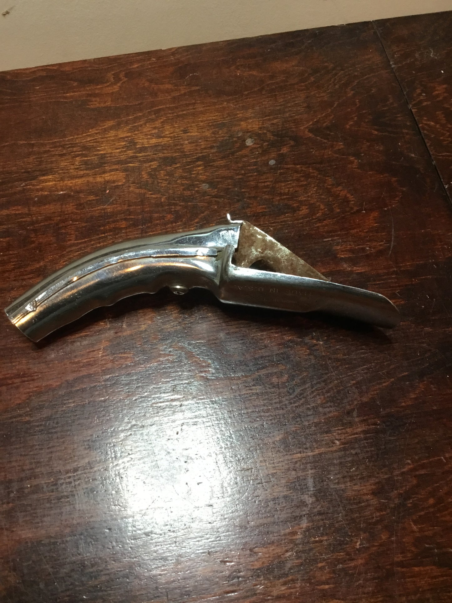 Vintage oil can spout with makers name