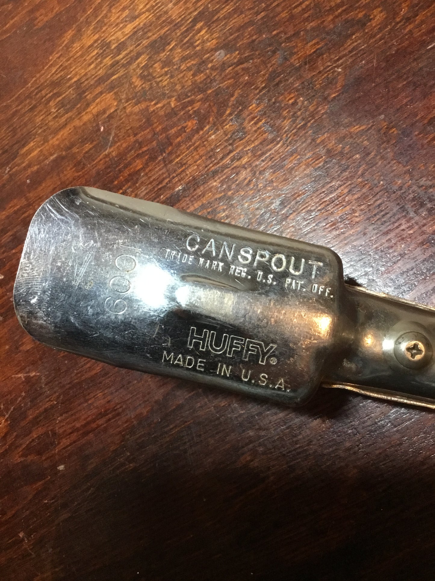Vintage oil can spout with makers name