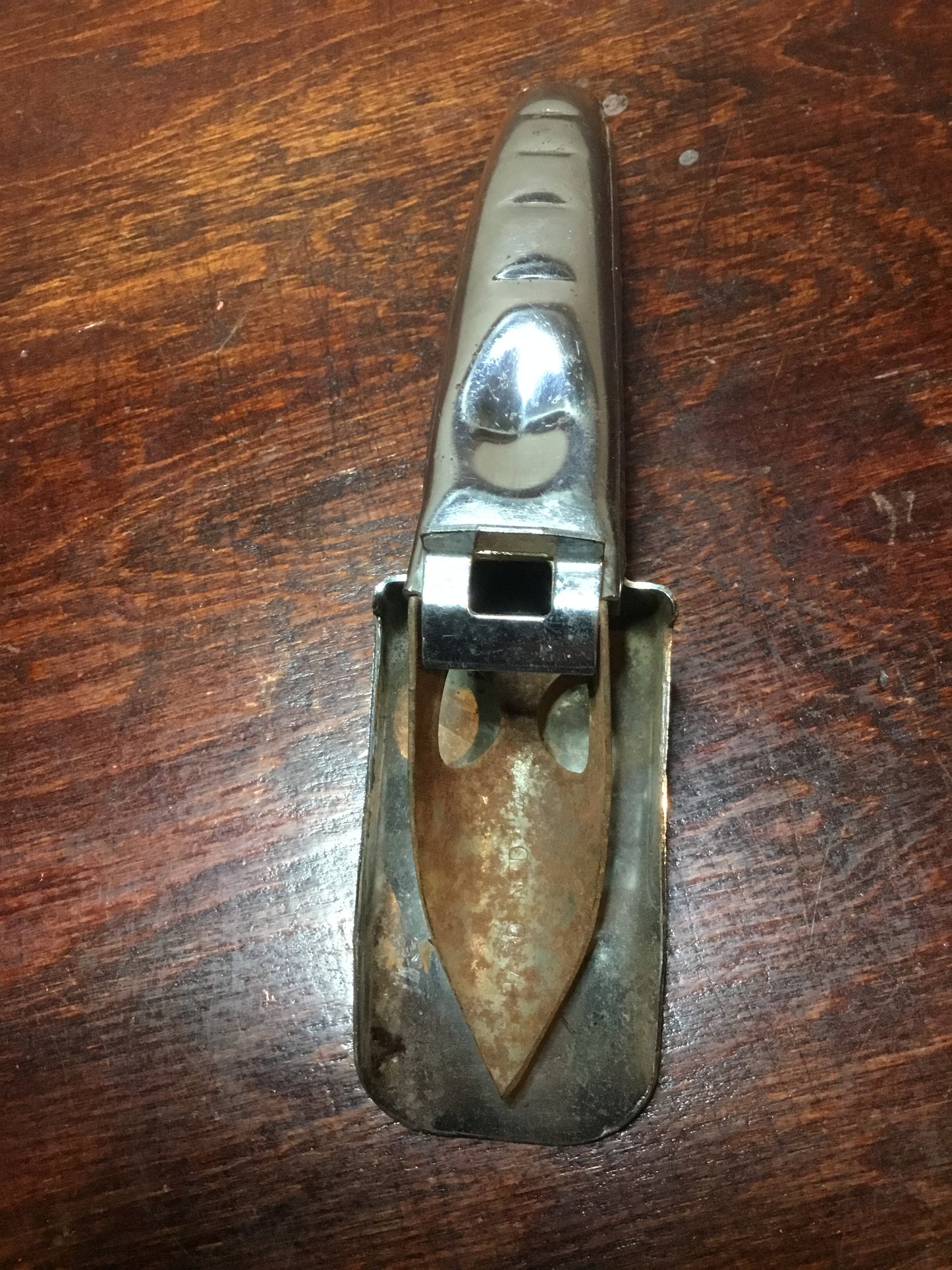 Vintage oil can spout with makers name