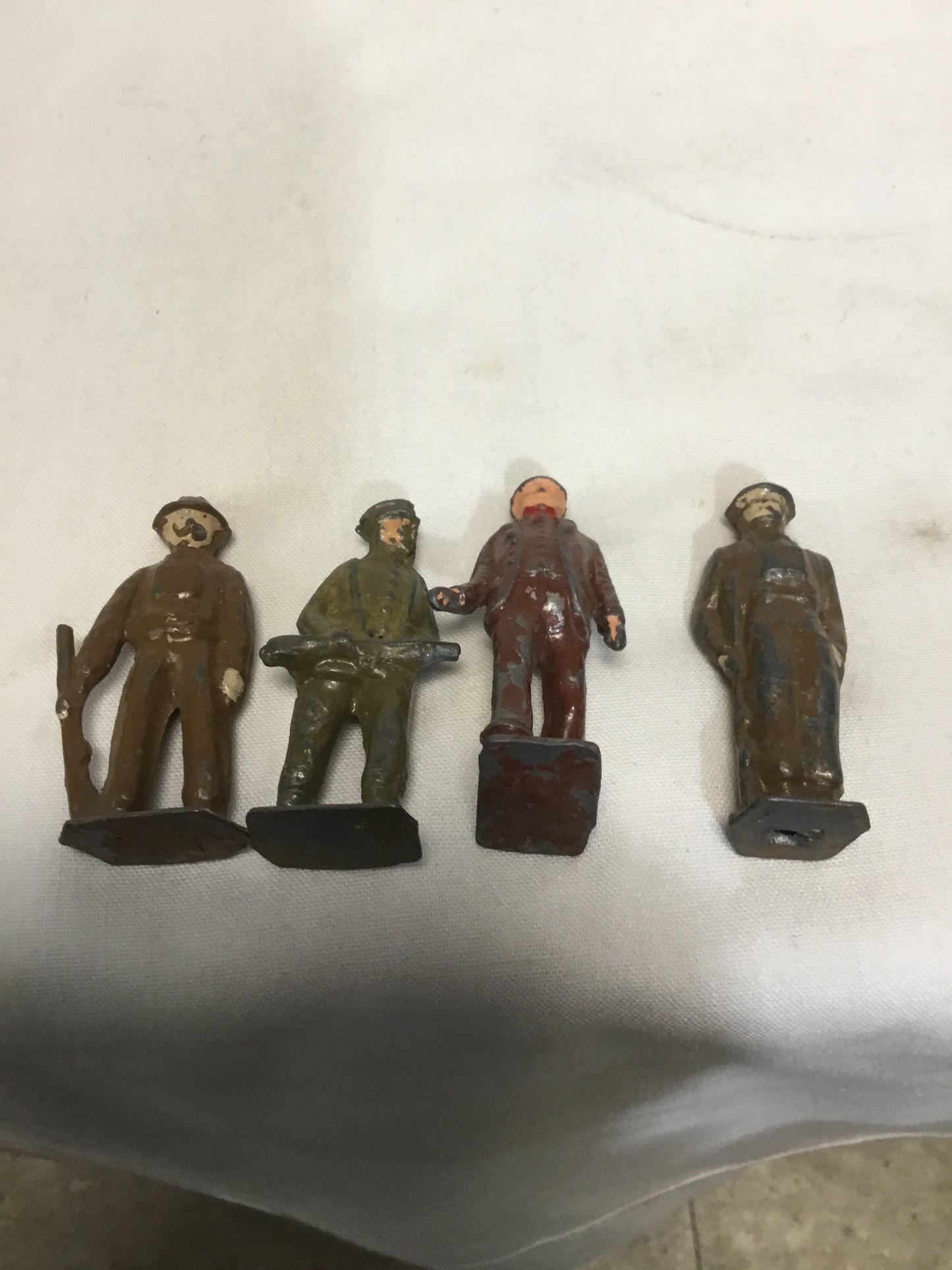 Lot of 4 Medal Toy Soldiers