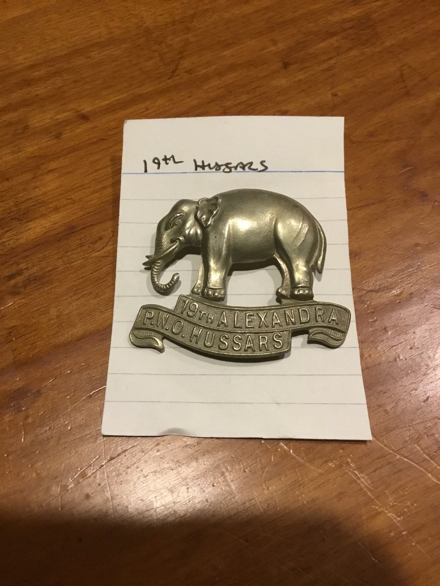 BRITISH ARMY METAL CAP BADGE 19TH ALEXANDRA PWO HUSSARS
