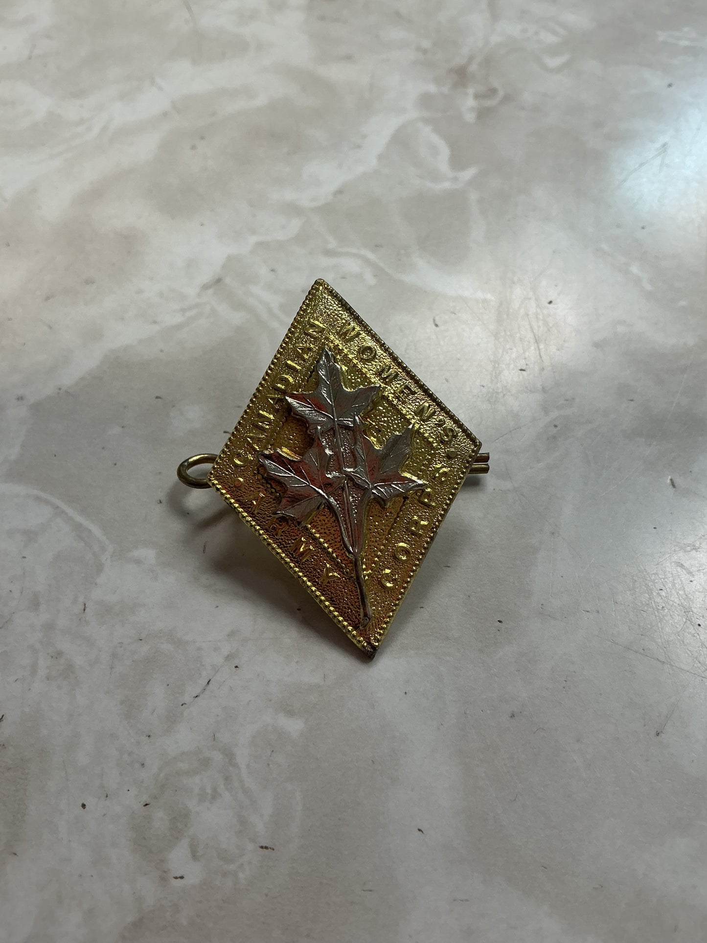 Canadian Women's Army Corps Cap Badge , lugs on the back with cotter pin