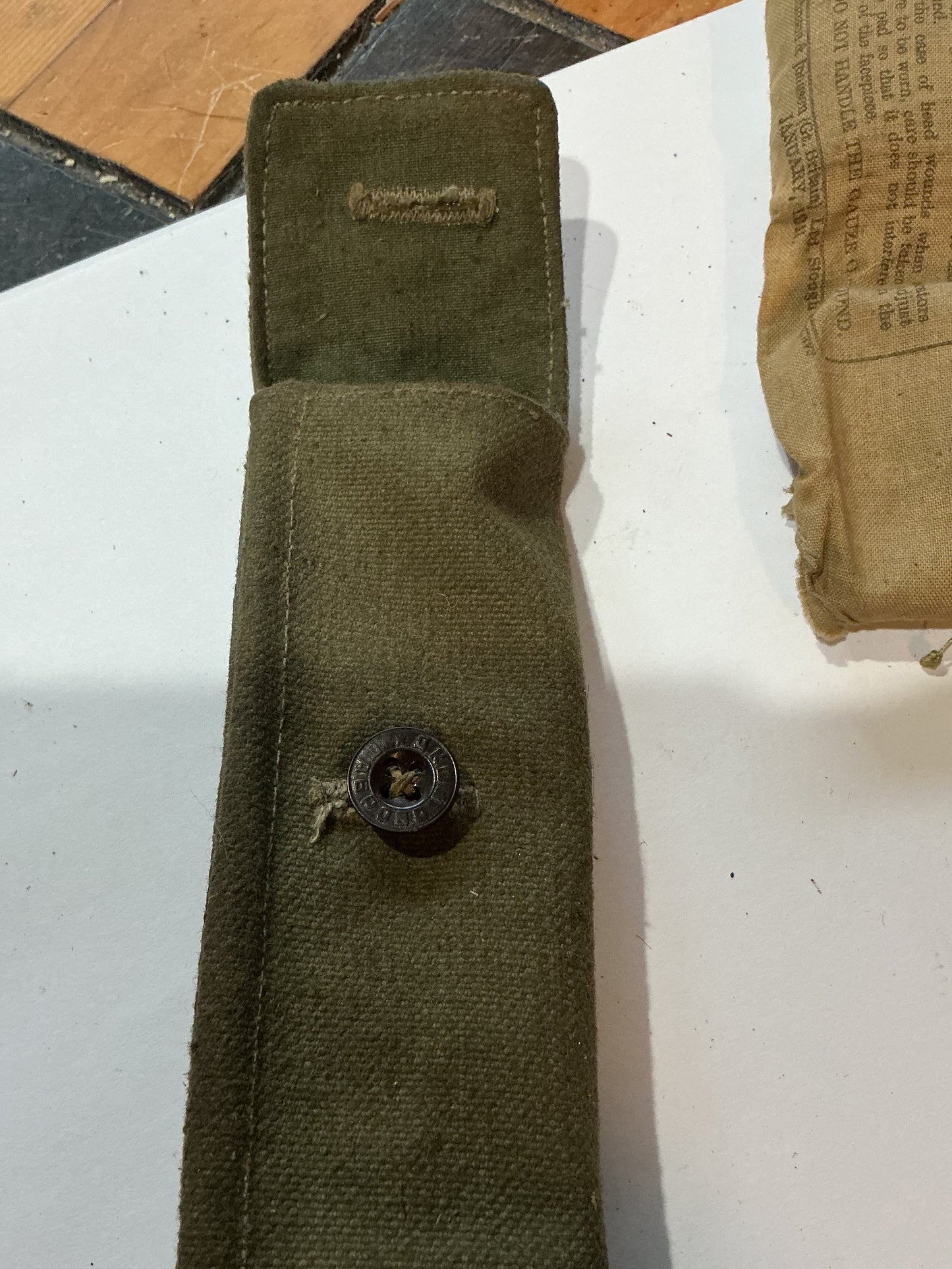 WW11 partial Field Dressing 1941 , and Mosin-Nagant cleaning and tool kit