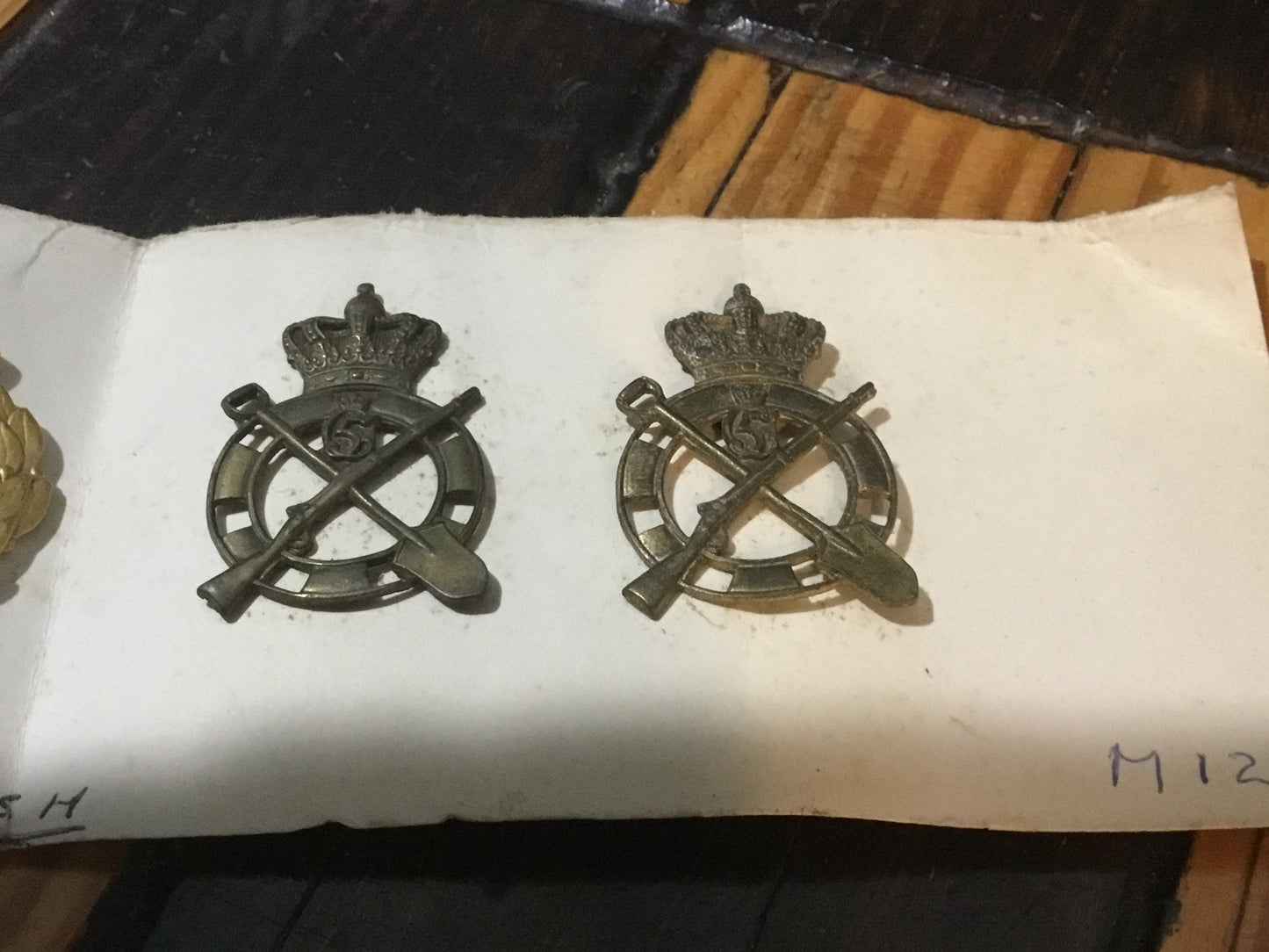 Lot of four Zealand Engineer Regiment beret badges and Danish, Post WW2, Army Command General Staff Cap Badge, 2 lugs