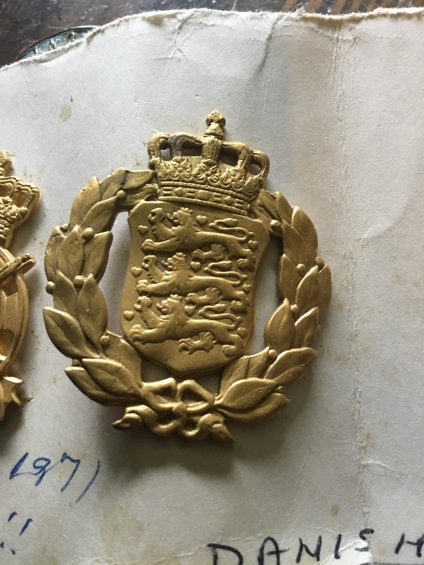 Lot of four Zealand Engineer Regiment beret badges and Danish, Post WW2, Army Command General Staff Cap Badge, 2 lugs