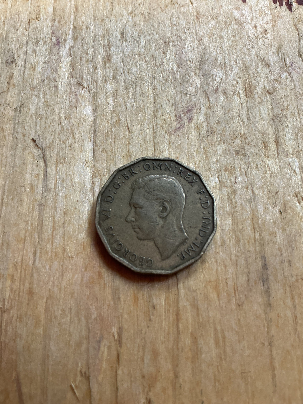 1944 British Threepence coin in good used (circulated) condition
