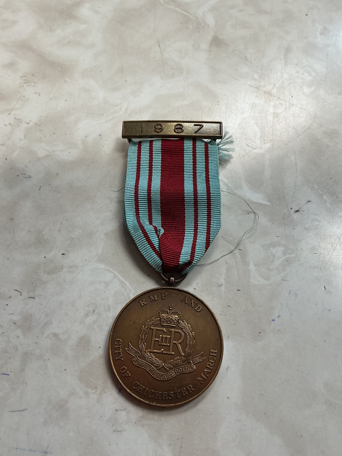 British Army 1987 RMP City of Chichester March Pin Badge Medal BM. In good condition
