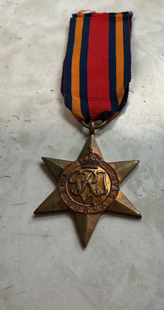 WW11 Canadian /British Burma star , some surface wear .