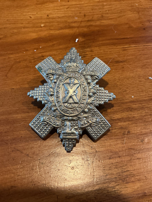 Black Watch (Royal Highland Regiment). Cap Badge. Kings Crown in white-metal