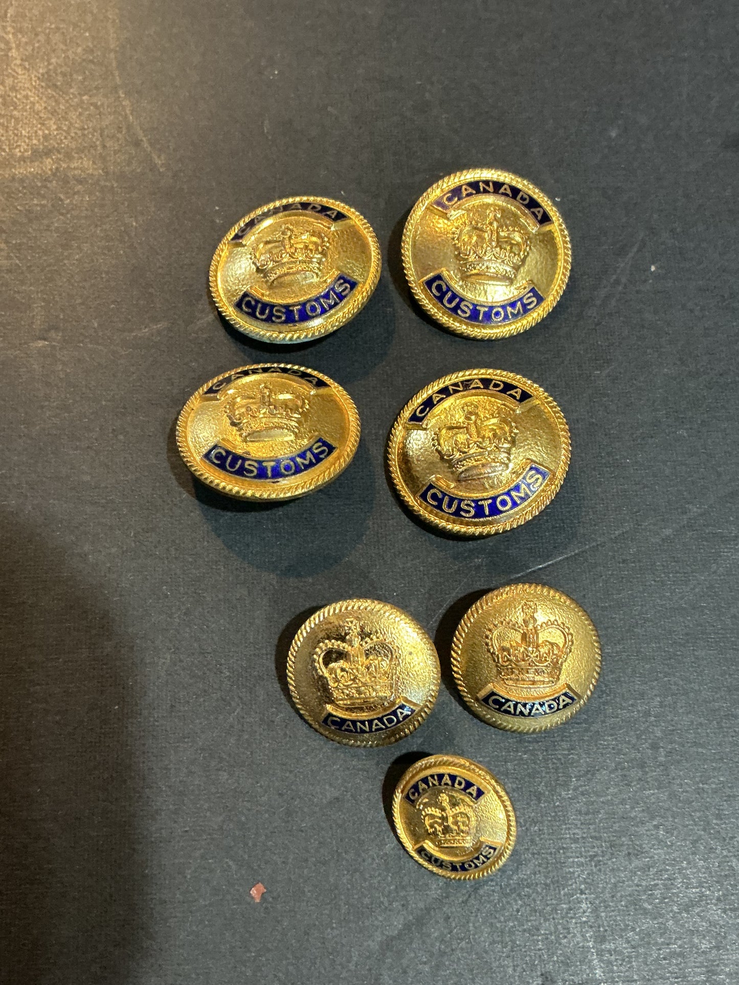 Lot of 7 Canadian Customs Medal Buttons