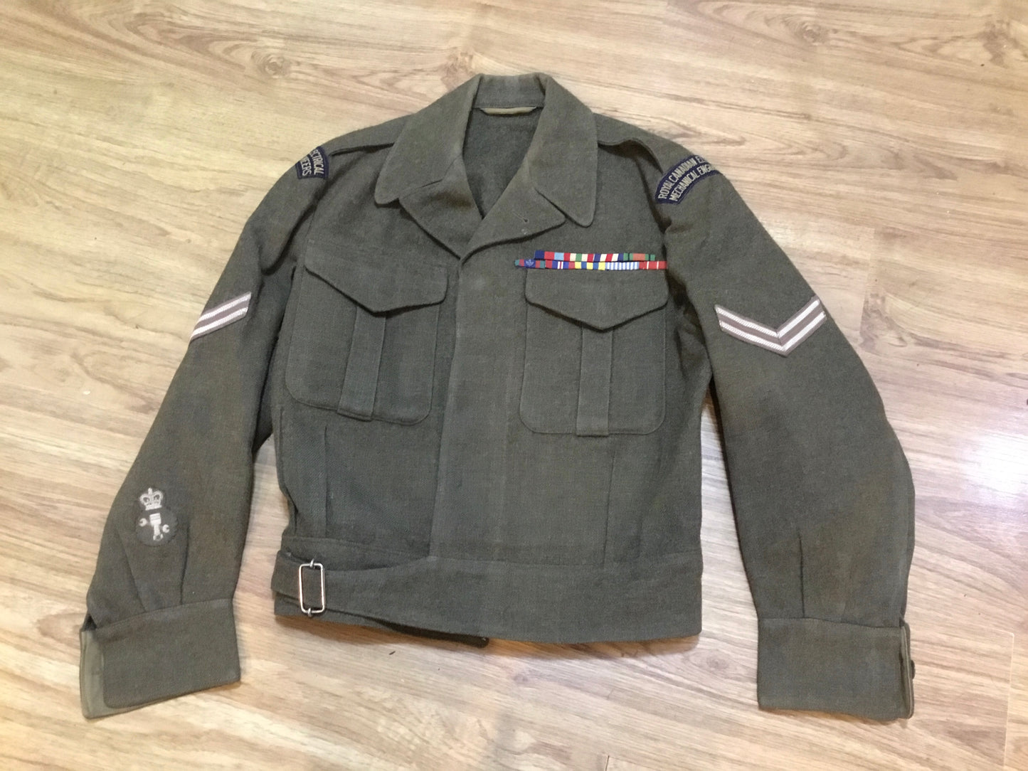 Post war Royal Canadian Electrical mechanical Engineers battle dress tunic with ribbon bar