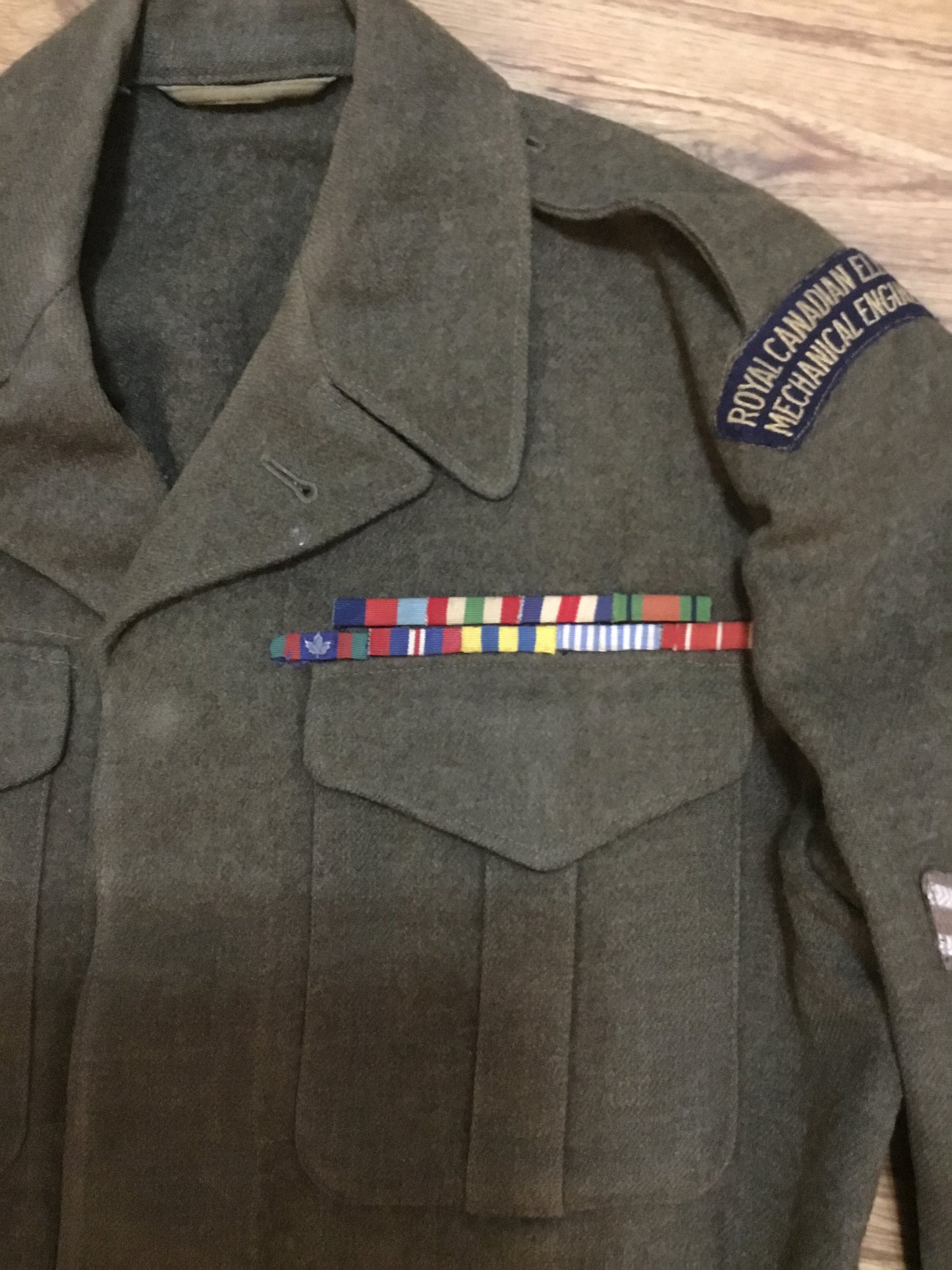 Post war Royal Canadian Electrical mechanical Engineers battle dress tunic with ribbon bar