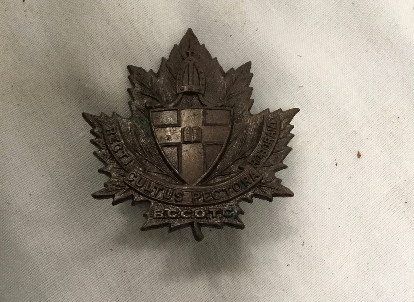 Canada.Bishops College Contingent O.T.C. cap badge