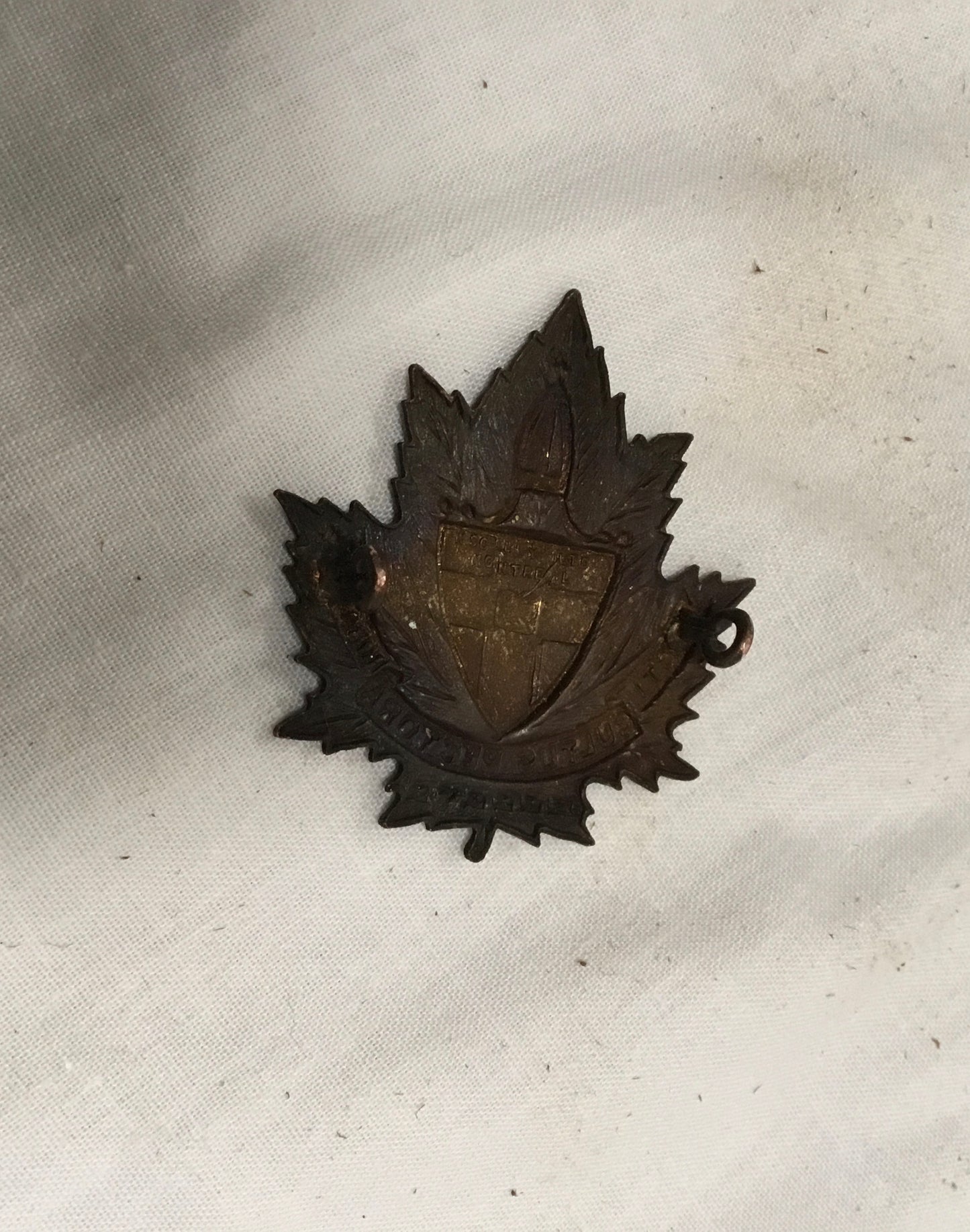 Canada.Bishops College Contingent O.T.C. cap badge