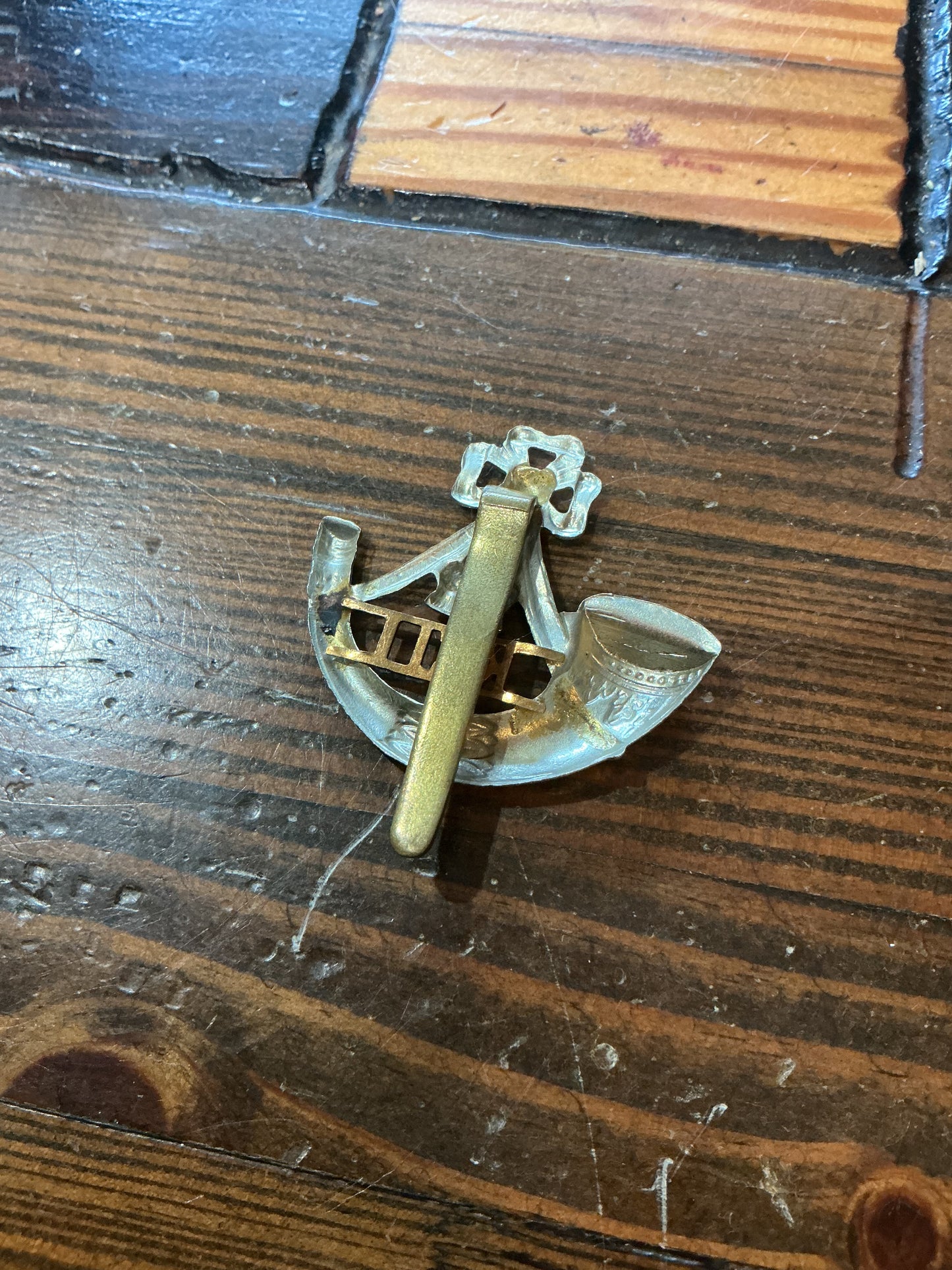 British Army cap badge for the King's Shropshire Light Infantry (KSLI)