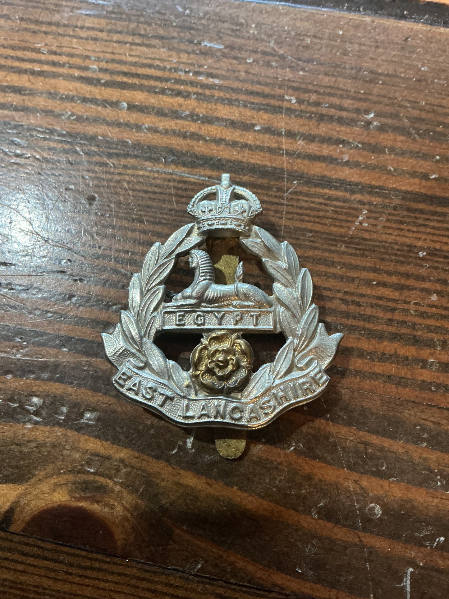 British East Lancashire Regiment cap badge Kings Crown