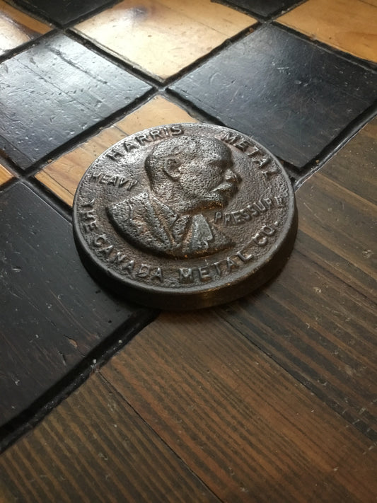 Vintage Harris Metal , Advertising. Paper Weigh