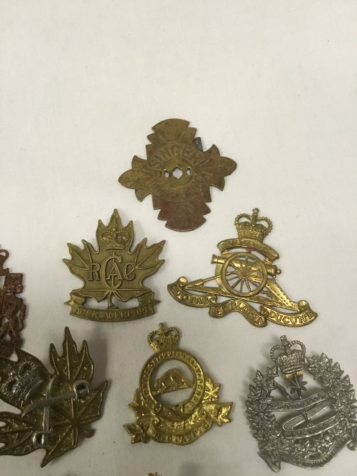 Lot of 11 Post War Canadian military Badges ( IN NEED OF REPAIR)