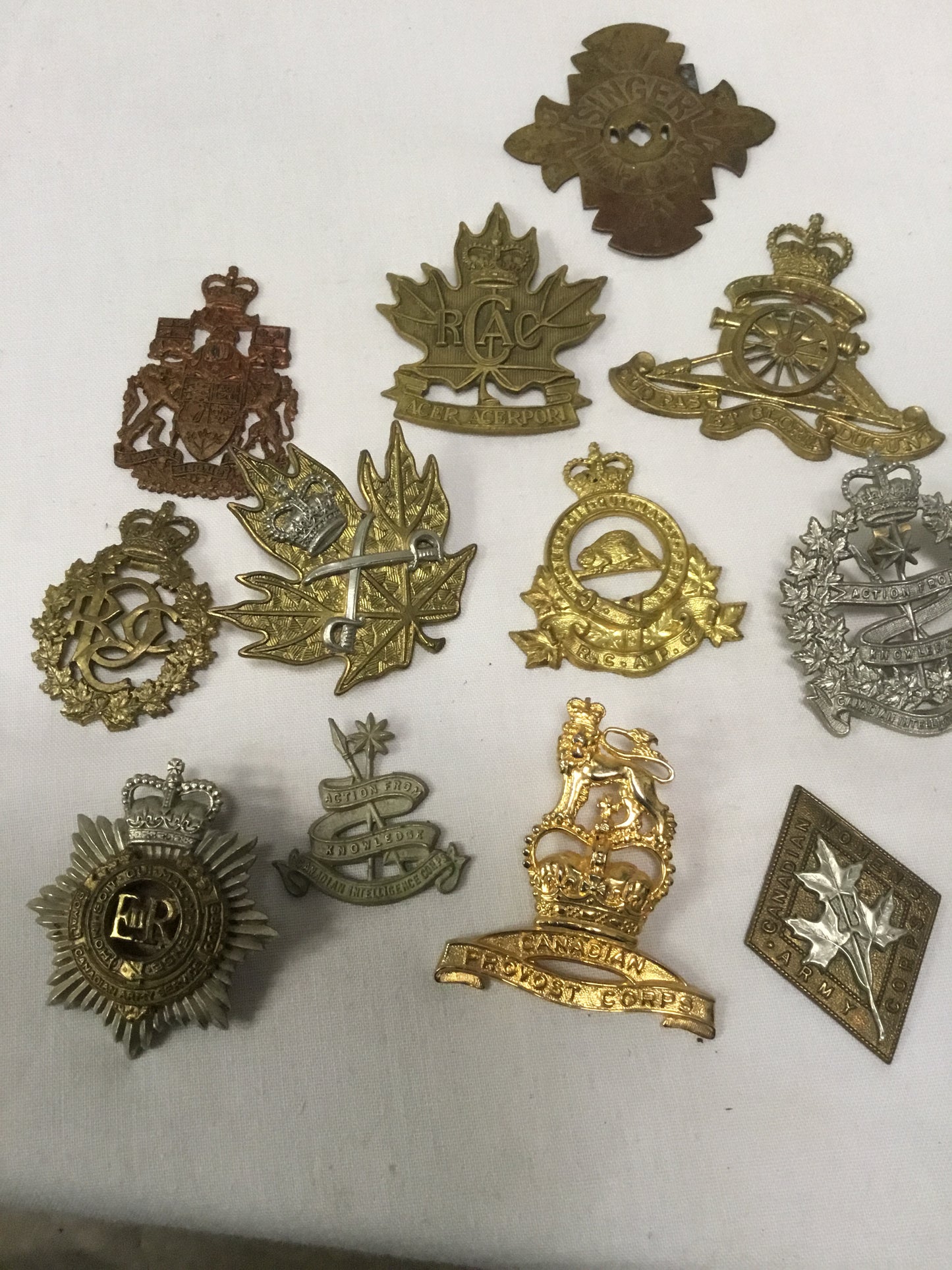 Lot of 11 Post War Canadian military Badges ( IN NEED OF REPAIR)