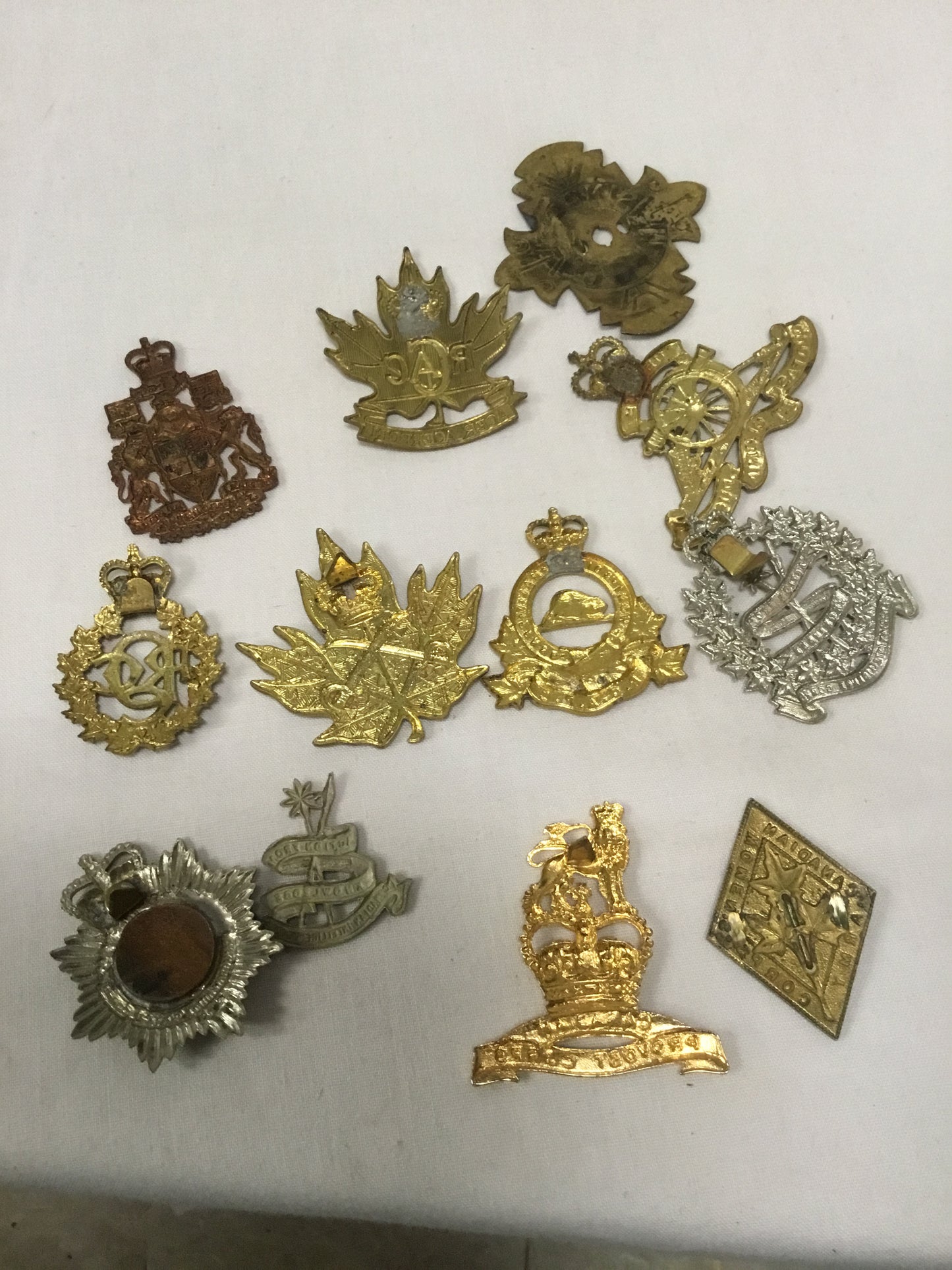 Lot of 11 Post War Canadian military Badges ( IN NEED OF REPAIR)