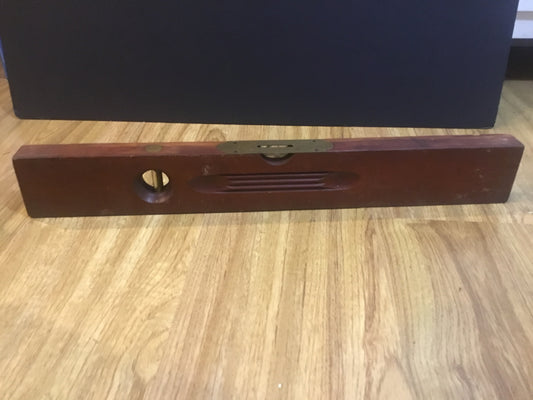 Antique wooden level  , with makers name  HENRY DISSTON  & Sons