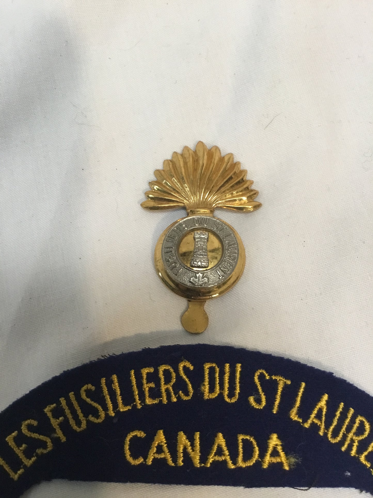 Canadian Military  Les Fusiliers du St.Laurent. bi-metal cap badge and Shoulder Flash