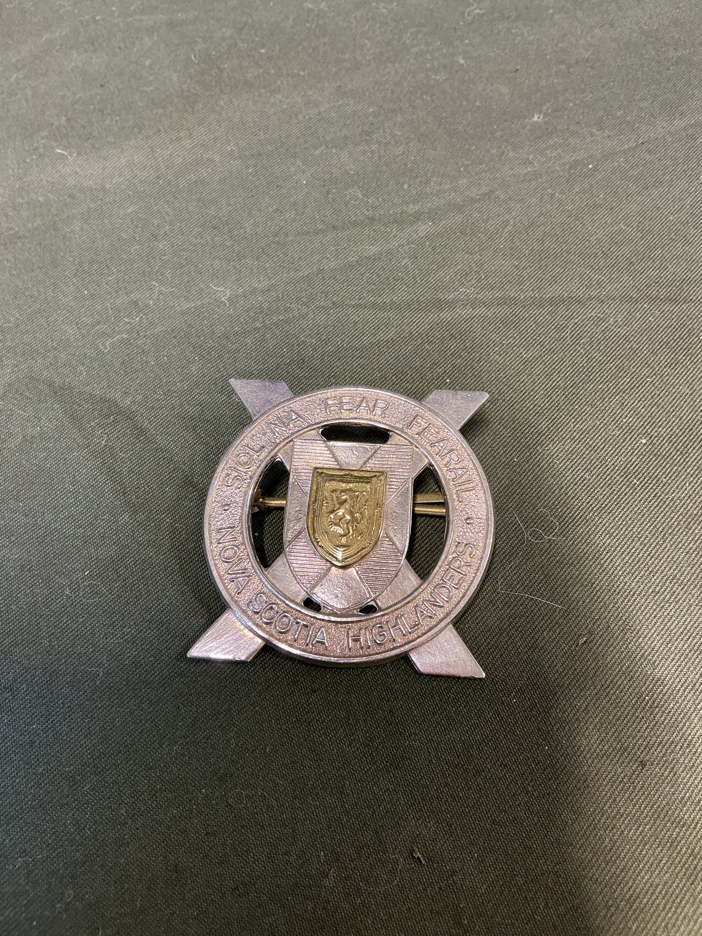 Nova Scotia Highlanders Cap badge , lugs on the back