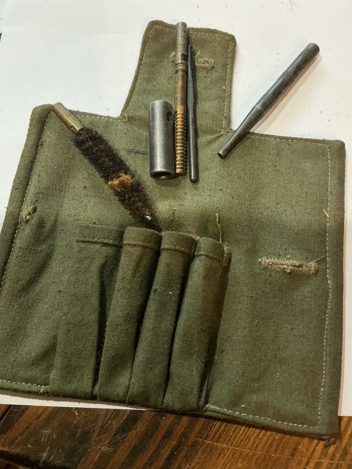 WW11 partial Field Dressing 1941 , and Mosin-Nagant cleaning and tool kit