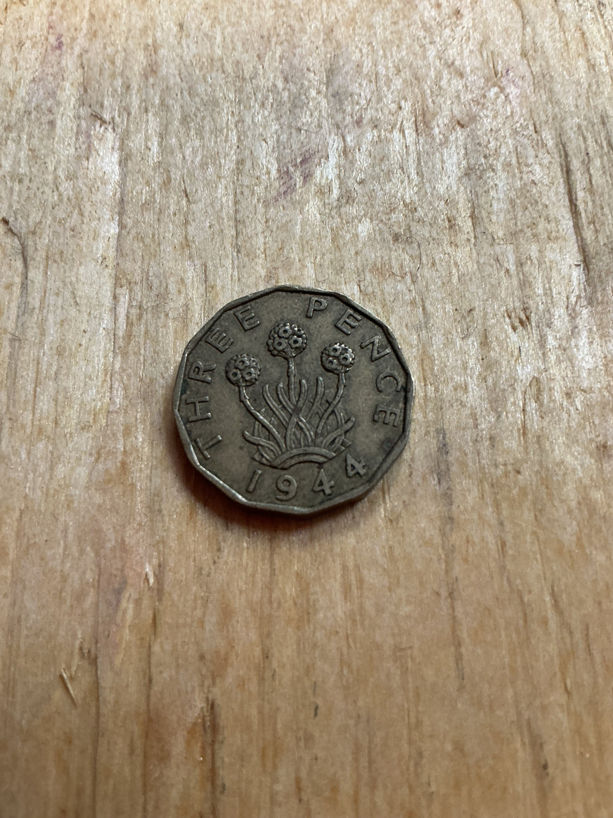 1944 British Threepence coin in good used (circulated) condition