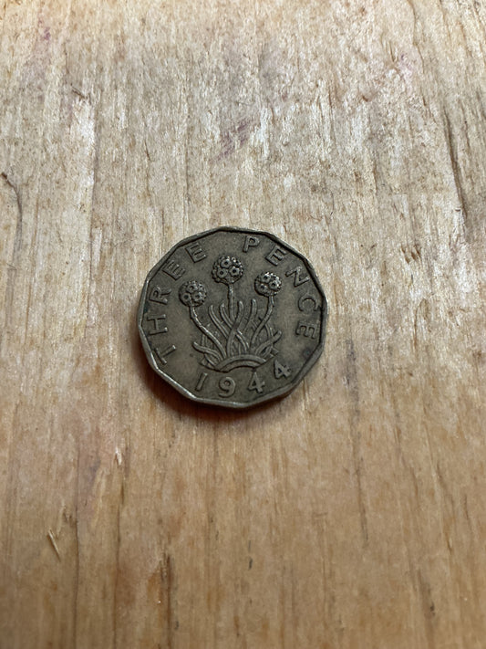 1944 British Threepence coin in good used (circulated) condition