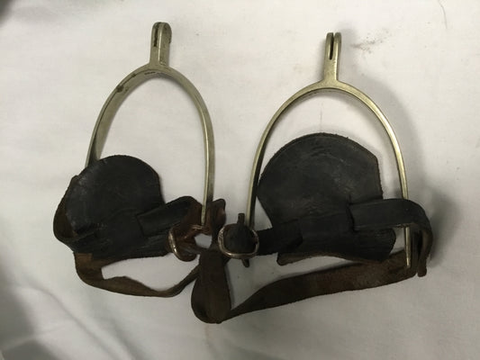 Early pair of spurs with leather boot straps